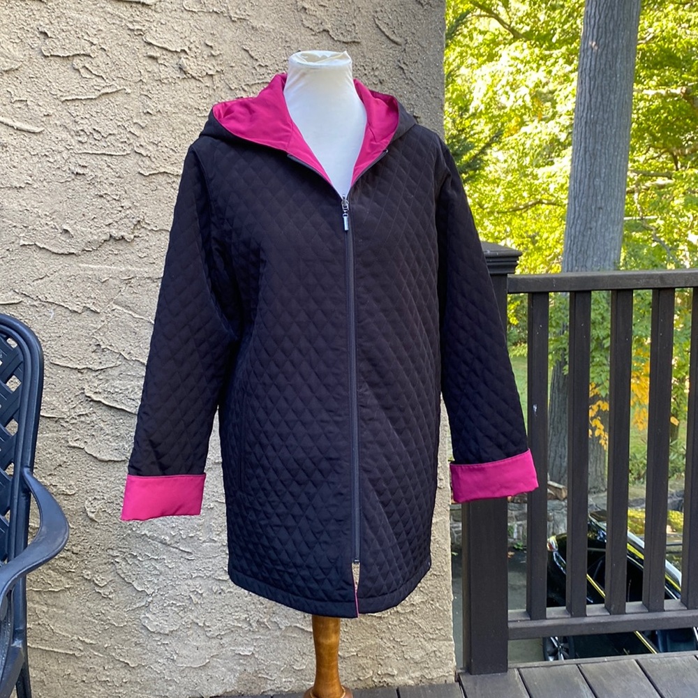 Black quilted reversible coat.